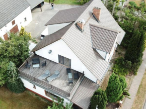 Large holiday home with roof terrace and big garden with lounge area and grill in Mönkebude